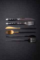 Kitchen knife and fork made of steel with copy space