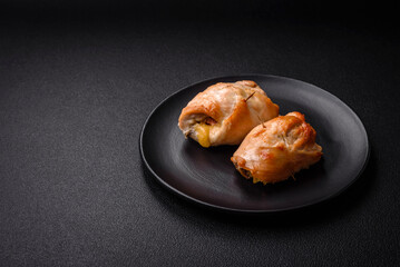 Delicious fresh meat roll made from chicken fillet, mushrooms, spices and herbs