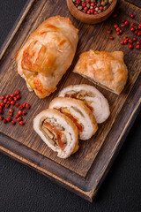 Delicious fresh meat roll made from chicken fillet, mushrooms, spices and herbs
