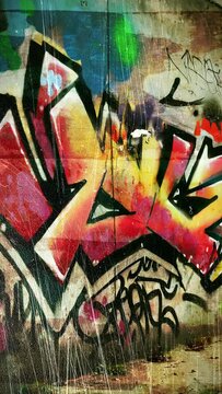 Graffiti with grunge texture, background loop. Graffiti images are fictitious non-infringing AI-generated. Vertical video.