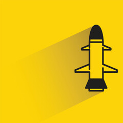 missile icon with shadow on yellow background