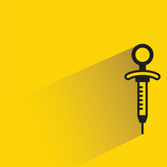 syringe icon with shadow on yellow background