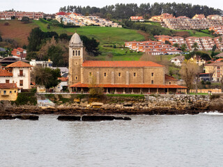 Fototapeta na wymiar Panoramic view of the church of Santa Maria de Luanco (18th century). Gozon, Asturias, Spain.