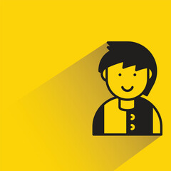 boy student with shadow on yellow background