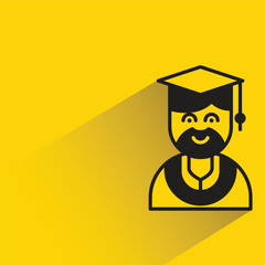 graduation student with shadow on yellow background