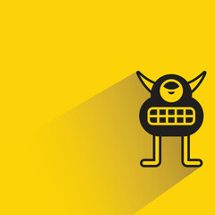 funny monster icon with shadow on yellow background