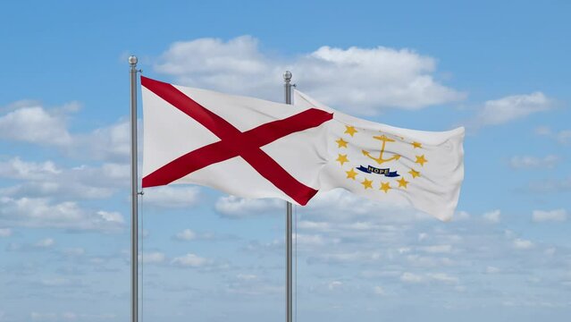 Rhode Island and Alabama US state flags waving together on cloudy sky, endless seamless loop