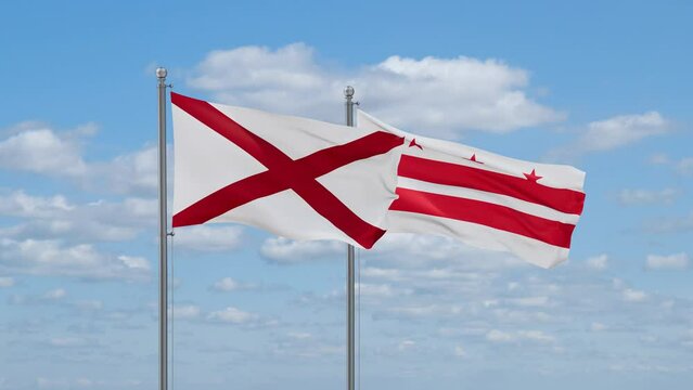 District of Columbia or Washington D.C. and Alabama US state flags waving together on cloudy sky, endless seamless loop