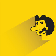 angry man with shadow on yellow background