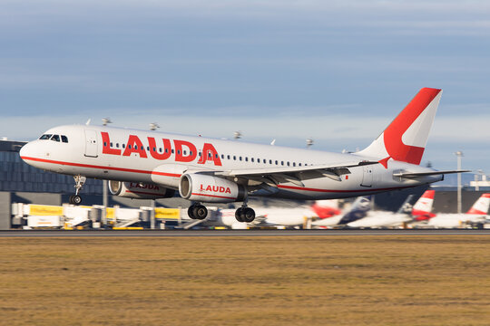 Vienna, Schwechat - January 07, 2023: An Airbus A320 of austrian low cost airline Lauda, part of Ryanair, landing at its homebase Vienna