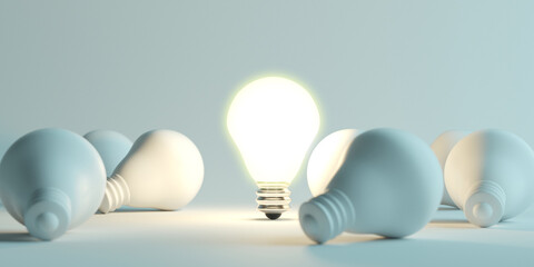 Illuminated light bulb standing Out in Crowd. Creative idea and inspire innovation