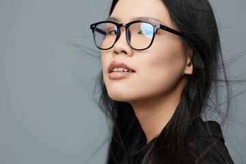 Fototapeta premium Woman portrait beautiful background smile asian fashion glasses
