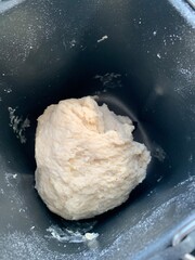 flour and eggs, Raw dough of bread in the bread maker machine