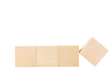 Four wooden cubes, one cube turned over. Transparent isolated background. copy space.