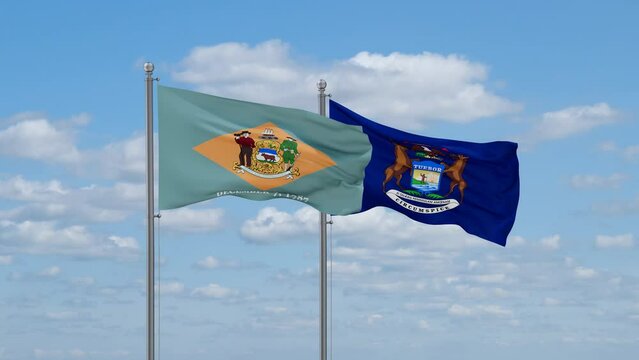 Michigan and Delaware US state flags waving together on cloudy sky, endless seamless loop