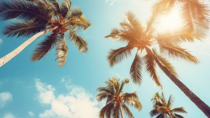 Foto op Canvas Blue sky and palm trees view from below, vintage style, tropical beach and summer background, travel concept Generative Ai © Nisa