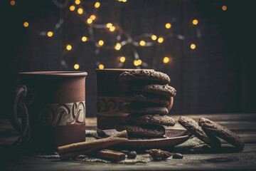 New Year's sweets with coffee and mulled wine, chocolate cookies and hot drinks on New Year's Eve