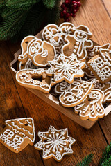 Tasty sweet Christmas cookies on a background. - 693900574