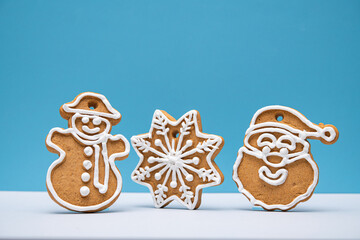 Tasty sweet Christmas cookies on a background. - 693900760