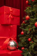 Christmas tree and gifts on a background. Red color box. - 693900973