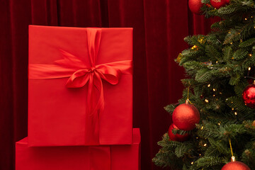Christmas tree and gifts on a background. - 693901124