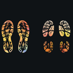 Watercolor footprints with black background .