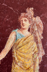 Figure of a woman painted in a Fresco in a Domus of Pompeii, the ancient Roman city of Pompeii, a UNESCO heritage site, destroyed by the eruption of the Vesuvius in 79 BC - 693905747