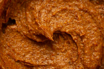 Baby food, vegetable puree close-up. Apple-carrot puree chopped in a blender. Background texture of food for newborn children.