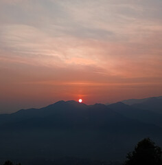 Fototapeta premium sunset over the mountains
