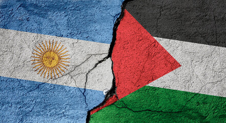 Argentina and Palestine flags on a stone wall with a crack, illustration of the concept of a global crisis in political and economic relations