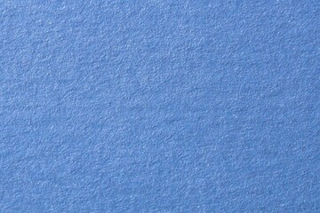 Blue fluffy velvet texture background. Blue velvet fabric