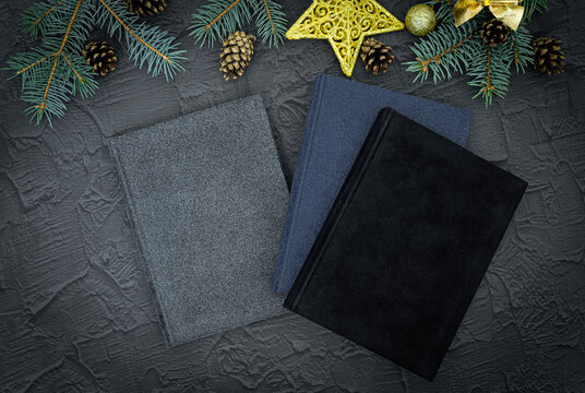 Cristmas gift. Notebook as a Christmas present. Close up of a blank velour fluffy notebook on black background with clipping path