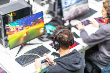 Gamer playing computer video game