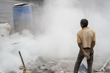 Bore Well Drilling in Progress  with a Dedicated Helper Collaboration and Dust in indian street...