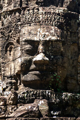 Gargantuan face on top of the entrance gate of the Banteay Kdei temple, Angkor, Cambodia, Asia