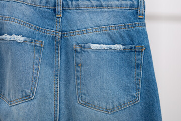 Fototapeta premium Close up of back pocket of jeans pants denim detail