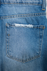 Fototapeta premium Close up of back pocket of jeans pants denim