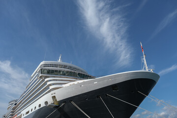Classic british luxury ocean liner cruiseship cruise ship in port with detail view of steel hull,...