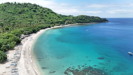 Sentigi Beach, located in Senggigi, West Lombok. Beautiful beach with clear water and green coral