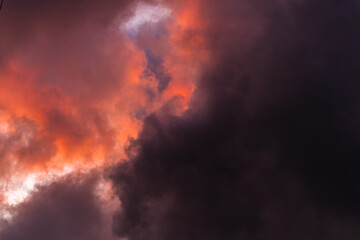 Rainy colorful clouds at sunset