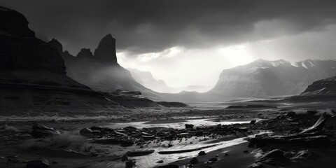 A black and white photo capturing the beauty of a mountain valley. This image can be used to evoke a sense of tranquility and awe.