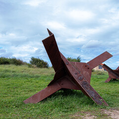 Utah beach star rusty metal structure to prevent infantry troops from advancing along the beach on...