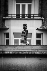 Chimneys, balconies, terraces and roofs of houses and city flats in white and black bw