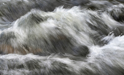 water flowing over rocks