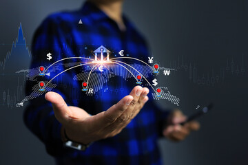 International banking transaction and currency exchange concept with hand holding the world map to transfer money from central bank to continental as pin around the world