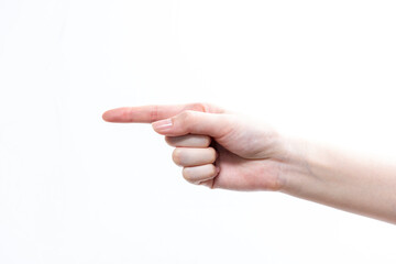 指を指す女性の手（真横）