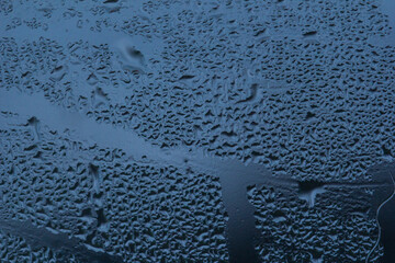 Water drops on the window after rain, wet glass texture