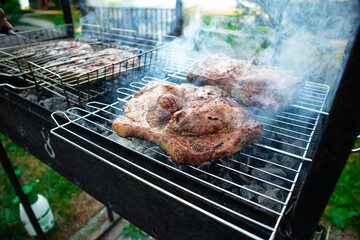Large grilled pork steaks close-up