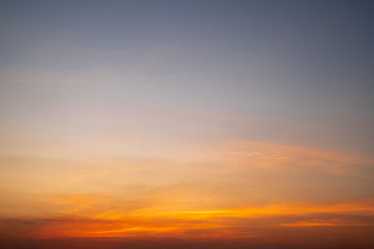 Beautiful , luxury soft gradient orange gold clouds and sunlight on the blue sky perfect for the background, take in everning,Twilight, Large size, high definition landscape photo