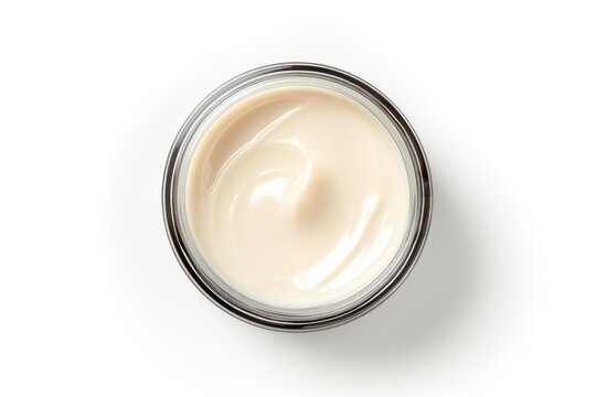A jar of cream placed on a clean and bright white surface. This image can be used for skincare, beauty products, cosmetics, or health-related designs